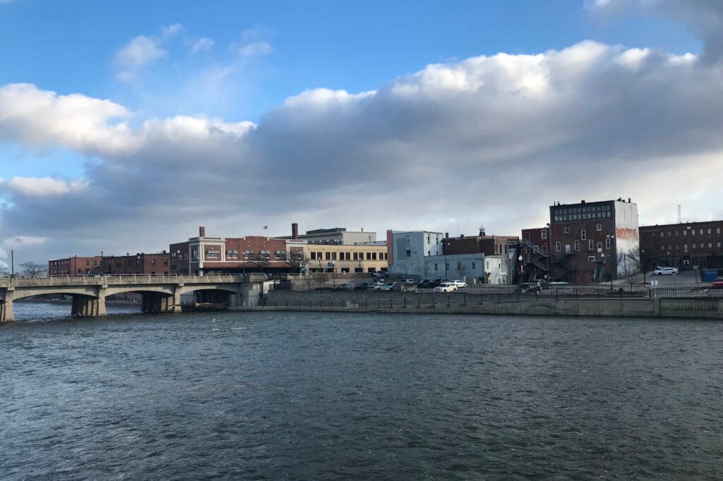 A cloudy view of Monroe, Michigan from the river. Monroe, Michigan is a location served by AAA Standard Services.